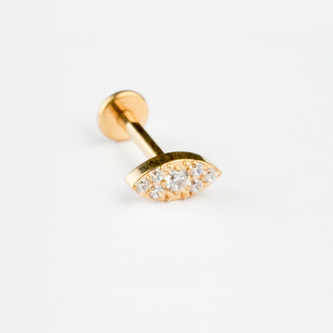 Pavé eye zircon ASTM F-136 titanium flat-back labret studs in golden and silver