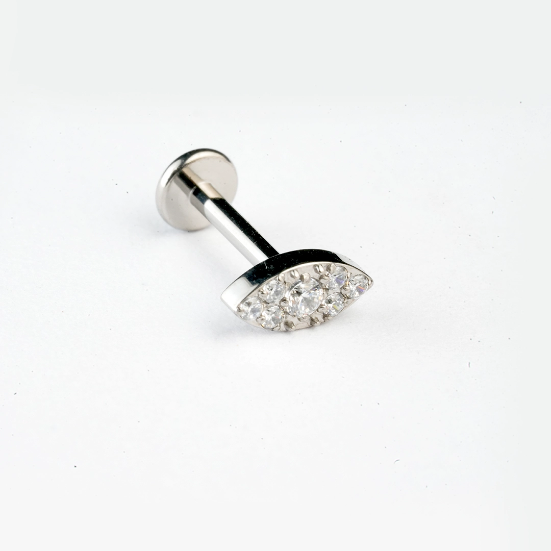 Pavé eye zircon ASTM F-136 titanium flat-back labret studs in golden and silver