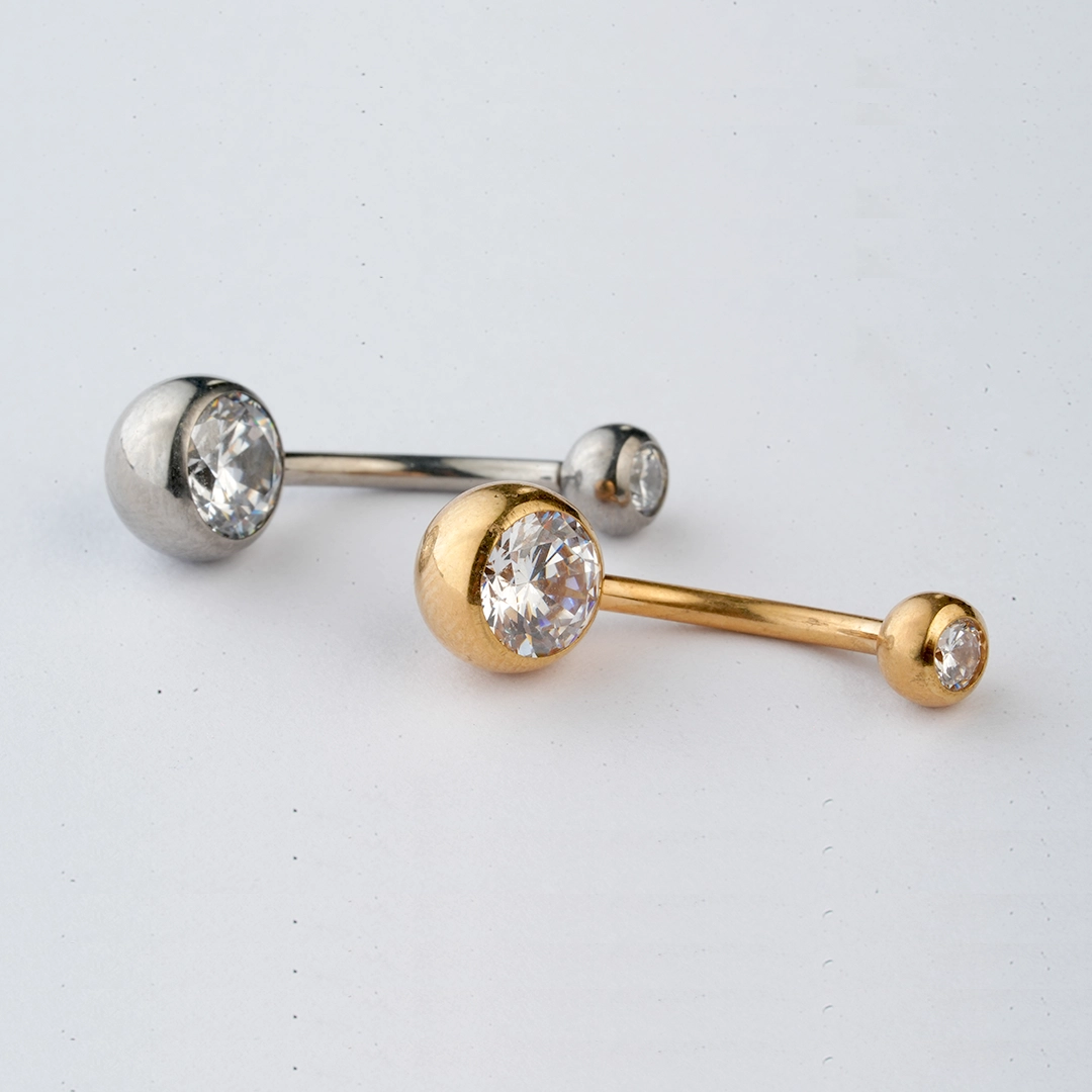 Double bezel zircon ASTM F-136 titanium navel barbell in golden and silver