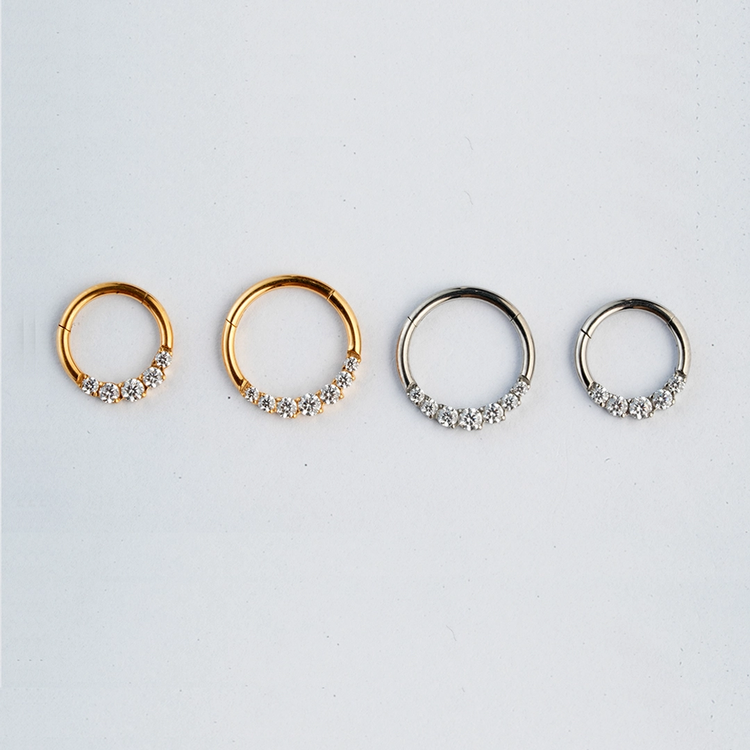Graduated round zircon ASTM F-136 titanium septum clicker in golden and silver