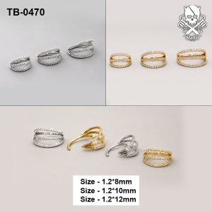 Golden and silver triple-band crossover zircon ASTM F-136 titanium clicker rings in three sizes