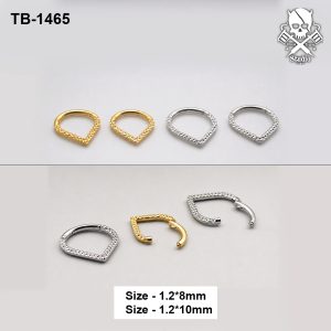 Golden and silver textured shield ASTM F-136 titanium clicker rings