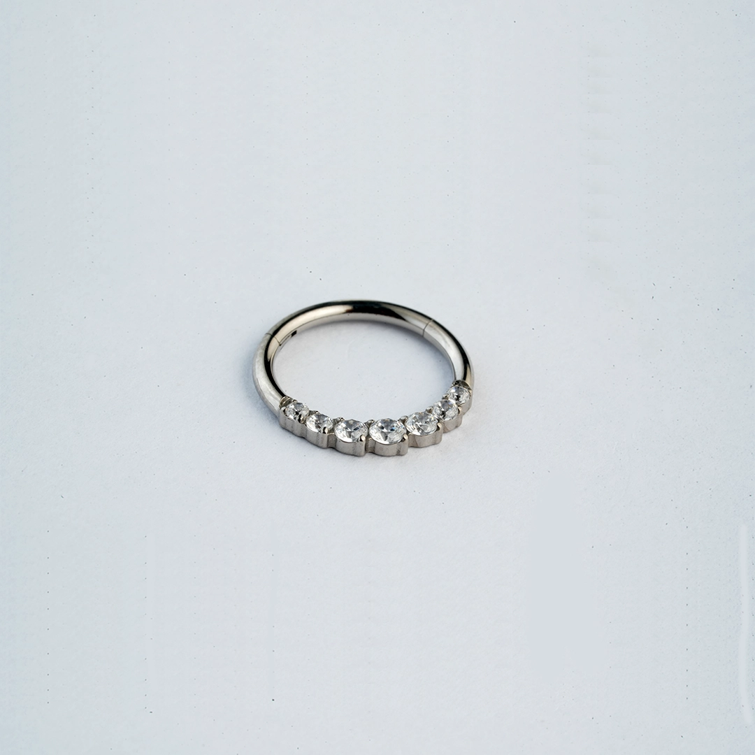 Graduated round zircon ASTM F-136 titanium septum clicker in golden and silver